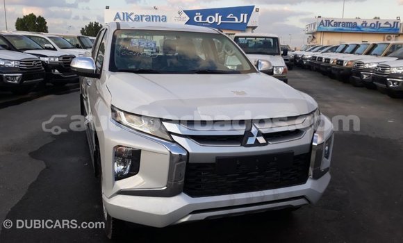 Buy Import Mitsubishi L200 White Car in Import - Dubai in Barbados Buy Import Mitsubishi L200 White Car in Import - Dubai in Barbados