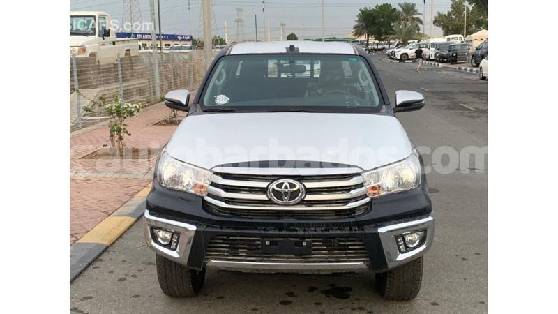 Big with watermark toyota hilux barbados import dubai 2124