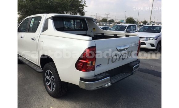 Buy Import Toyota Hilux White Car in Import - Dubai in Barbados Buy Import Toyota Hilux White Car in Import - Dubai in Barbados