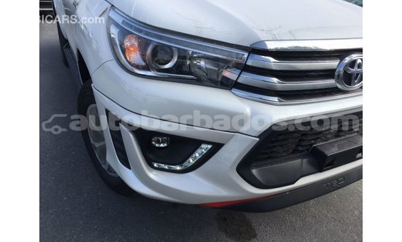 Buy Import Toyota Hilux White Car in Import - Dubai in Barbados Buy Import Toyota Hilux White Car in Import - Dubai in Barbados