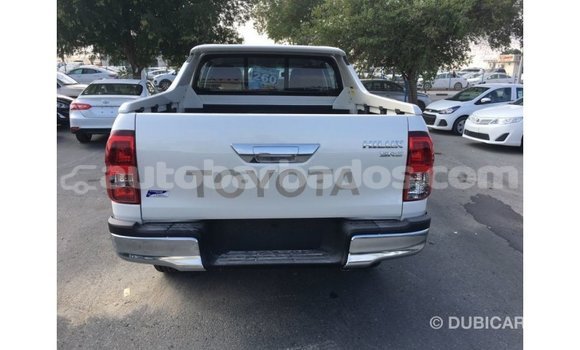 Buy Import Toyota Hilux White Car in Import - Dubai in Barbados Buy Import Toyota Hilux White Car in Import - Dubai in Barbados