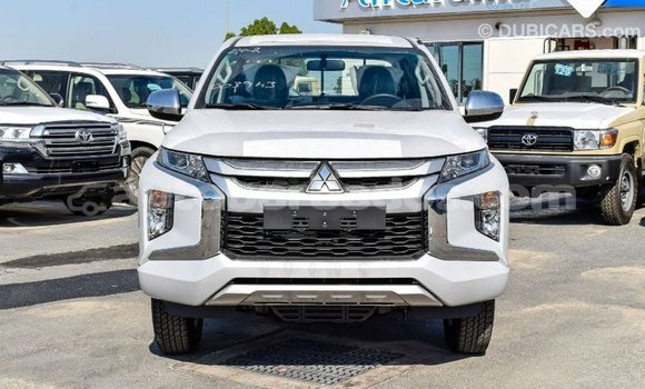 Buy Import Mitsubishi L200 White Car in Import - Dubai in Barbados Buy Import Mitsubishi L200 White Car in Import - Dubai in Barbados