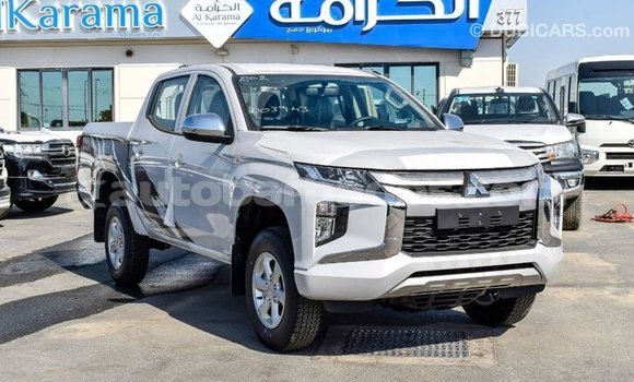 Buy Import Mitsubishi L200 White Car in Import - Dubai in Barbados Buy Import Mitsubishi L200 White Car in Import - Dubai in Barbados