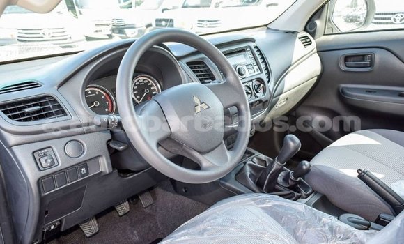 Buy Import Mitsubishi L200 White Car in Import - Dubai in Barbados Buy Import Mitsubishi L200 White Car in Import - Dubai in Barbados