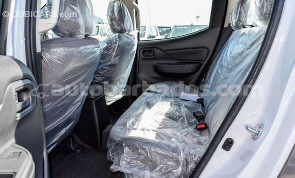 Buy Import Mitsubishi L200 White Car in Import - Dubai in Barbados Buy Import Mitsubishi L200 White Car in Import - Dubai in Barbados