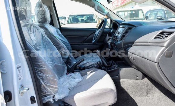 Buy Import Mitsubishi L200 White Car in Import - Dubai in Barbados Buy Import Mitsubishi L200 White Car in Import - Dubai in Barbados