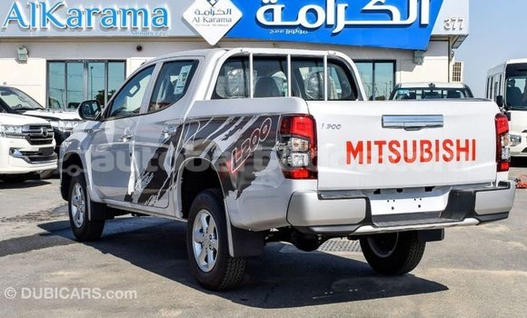 Buy Import Mitsubishi L200 White Car in Import - Dubai in Barbados Buy Import Mitsubishi L200 White Car in Import - Dubai in Barbados