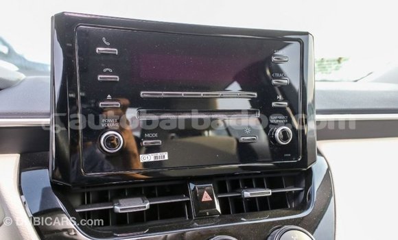Buy Import Toyota Corolla White Car in Import - Dubai in Barbados Buy Import Toyota Corolla White Car in Import - Dubai in Barbados