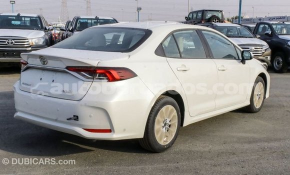 Buy Import Toyota Corolla White Car in Import - Dubai in Barbados Buy Import Toyota Corolla White Car in Import - Dubai in Barbados