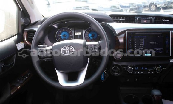 Buy Import Toyota Hilux White Car in Import - Dubai in Barbados Buy Import Toyota Hilux White Car in Import - Dubai in Barbados