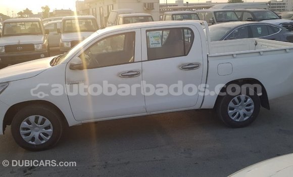 Buy Import Toyota Hilux White Car in Import - Dubai in Barbados Buy Import Toyota Hilux White Car in Import - Dubai in Barbados