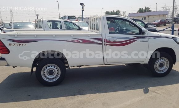 Buy Import Toyota Hilux White Car in Import - Dubai in Barbados Buy Import Toyota Hilux White Car in Import - Dubai in Barbados