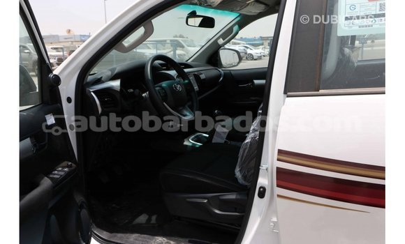 Buy Import Toyota Hilux White Car in Import - Dubai in Barbados Buy Import Toyota Hilux White Car in Import - Dubai in Barbados