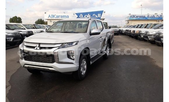 Buy Import Mitsubishi L200 White Car in Import - Dubai in Barbados Buy Import Mitsubishi L200 White Car in Import - Dubai in Barbados