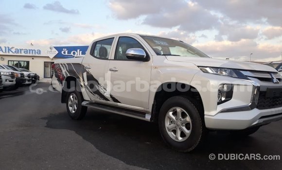 Buy Import Mitsubishi L200 White Car in Import - Dubai in Barbados Buy Import Mitsubishi L200 White Car in Import - Dubai in Barbados