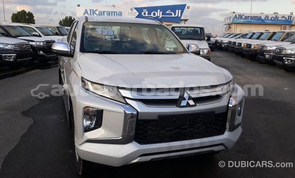 Buy Import Mitsubishi L200 White Car in Import - Dubai in Barbados Buy Import Mitsubishi L200 White Car in Import - Dubai in Barbados