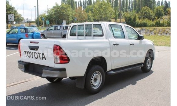 Buy Import Toyota Hilux White Car in Import - Dubai in Barbados Buy Import Toyota Hilux White Car in Import - Dubai in Barbados