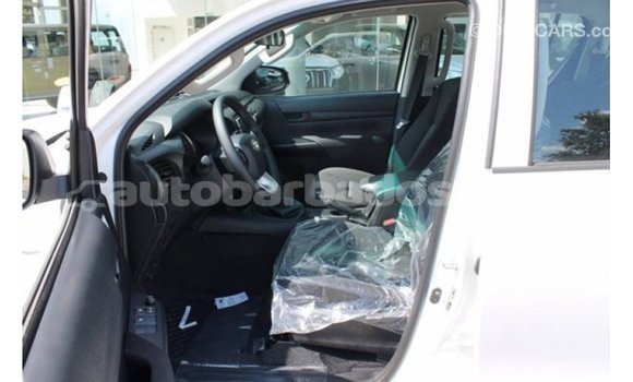 Buy Import Toyota Hilux White Car in Import - Dubai in Barbados Buy Import Toyota Hilux White Car in Import - Dubai in Barbados