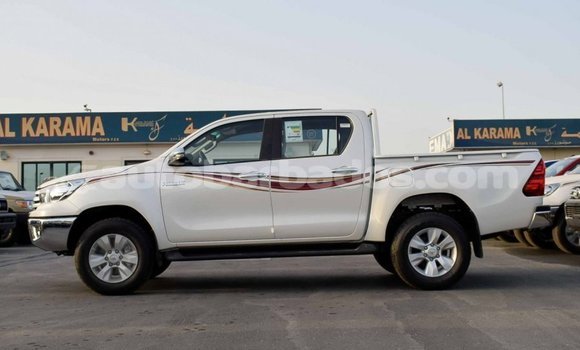 Buy Import Toyota Hilux White Car in Import - Dubai in Barbados Buy Import Toyota Hilux White Car in Import - Dubai in Barbados