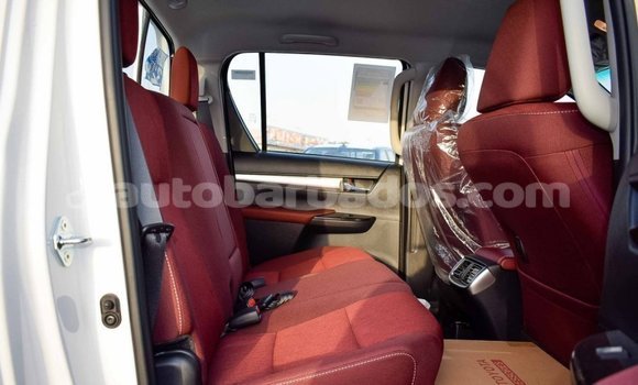 Buy Import Toyota Hilux White Car in Import - Dubai in Barbados Buy Import Toyota Hilux White Car in Import - Dubai in Barbados