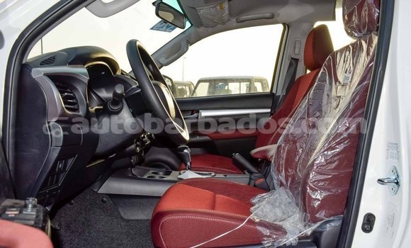 Buy Import Toyota Hilux White Car in Import - Dubai in Barbados Buy Import Toyota Hilux White Car in Import - Dubai in Barbados