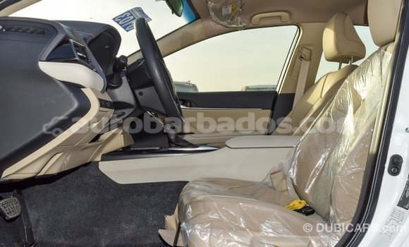 Buy Import Toyota Camry White Car in Import - Dubai in Barbados Buy Import Toyota Camry White Car in Import - Dubai in Barbados