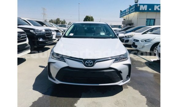 Buy Import Toyota Corolla White Car in Import - Dubai in Barbados Buy Import Toyota Corolla White Car in Import - Dubai in Barbados