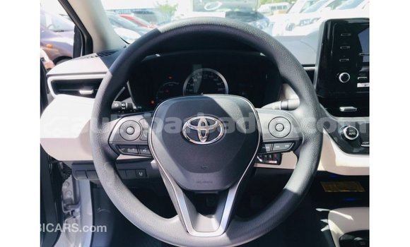 Buy Import Toyota Corolla White Car in Import - Dubai in Barbados Buy Import Toyota Corolla White Car in Import - Dubai in Barbados