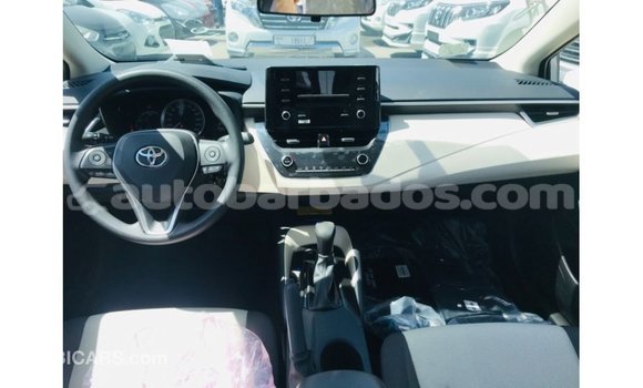 Buy Import Toyota Corolla White Car in Import - Dubai in Barbados Buy Import Toyota Corolla White Car in Import - Dubai in Barbados