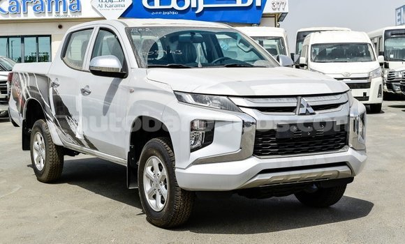 Buy Import Mitsubishi L200 White Car in Import - Dubai in Barbados Buy Import Mitsubishi L200 White Car in Import - Dubai in Barbados