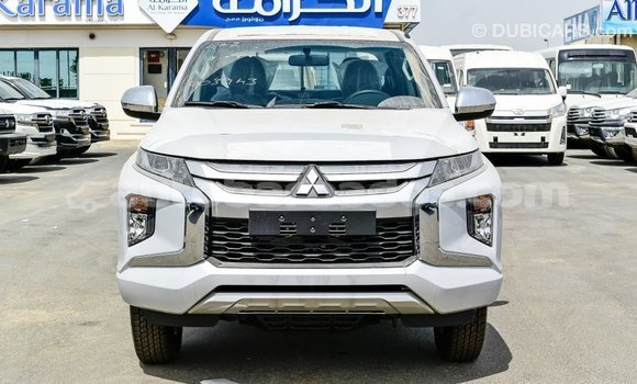Buy Import Mitsubishi L200 White Car in Import - Dubai in Barbados Buy Import Mitsubishi L200 White Car in Import - Dubai in Barbados