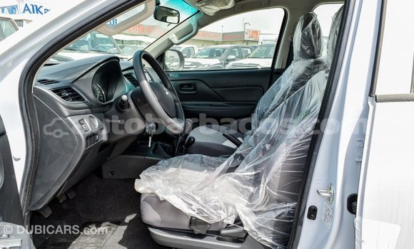 Buy Import Mitsubishi L200 White Car in Import - Dubai in Barbados Buy Import Mitsubishi L200 White Car in Import - Dubai in Barbados