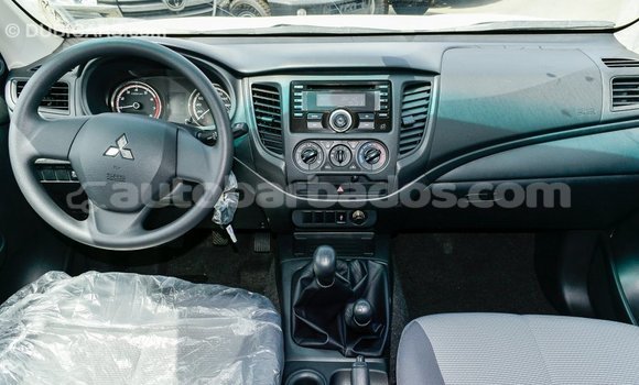 Buy Import Mitsubishi L200 White Car in Import - Dubai in Barbados Buy Import Mitsubishi L200 White Car in Import - Dubai in Barbados