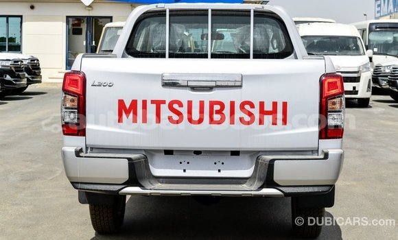 Buy Import Mitsubishi L200 White Car in Import - Dubai in Barbados Buy Import Mitsubishi L200 White Car in Import - Dubai in Barbados