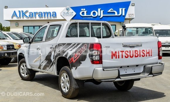 Buy Import Mitsubishi L200 White Car in Import - Dubai in Barbados Buy Import Mitsubishi L200 White Car in Import - Dubai in Barbados