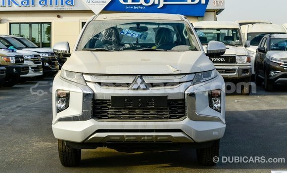 Buy Import Mitsubishi L200 White Car in Import - Dubai in Barbados Buy Import Mitsubishi L200 White Car in Import - Dubai in Barbados