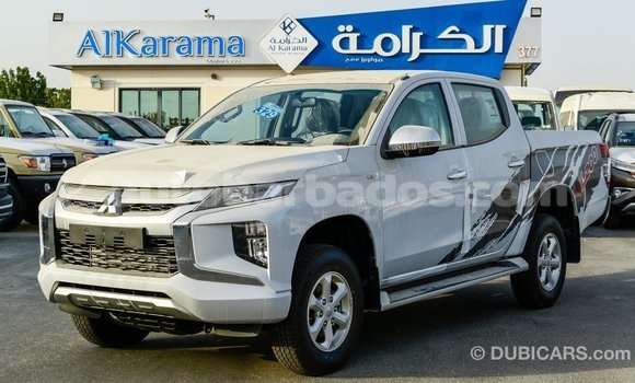 Buy Import Mitsubishi L200 White Car in Import - Dubai in Barbados Buy Import Mitsubishi L200 White Car in Import - Dubai in Barbados