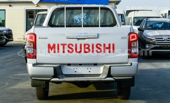 Buy Import Mitsubishi L200 White Car in Import - Dubai in Barbados Buy Import Mitsubishi L200 White Car in Import - Dubai in Barbados