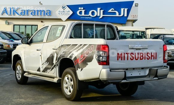 Buy Import Mitsubishi L200 White Car in Import - Dubai in Barbados Buy Import Mitsubishi L200 White Car in Import - Dubai in Barbados