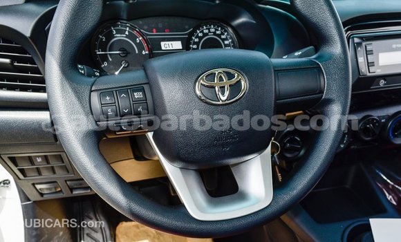 Buy Import Toyota Hilux White Car in Import - Dubai in Barbados Buy Import Toyota Hilux White Car in Import - Dubai in Barbados