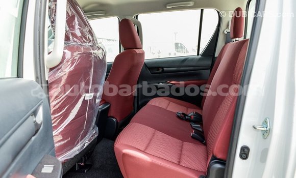 Buy Import Toyota Hilux White Car in Import - Dubai in Barbados Buy Import Toyota Hilux White Car in Import - Dubai in Barbados