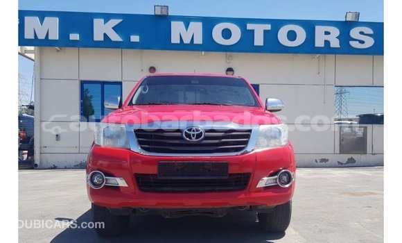 Buy Import Toyota Hilux Red Car in Import - Dubai in Barbados Buy Import Toyota Hilux Red Car in Import - Dubai in Barbados