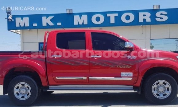 Buy Import Toyota Hilux Red Car in Import - Dubai in Barbados Buy Import Toyota Hilux Red Car in Import - Dubai in Barbados