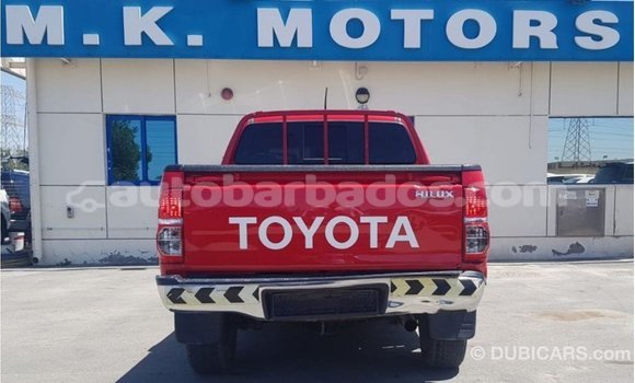 Buy Import Toyota Hilux Red Car in Import - Dubai in Barbados Buy Import Toyota Hilux Red Car in Import - Dubai in Barbados