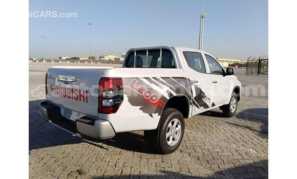 Buy Import Mitsubishi L200 White Car in Import - Dubai in Barbados Buy Import Mitsubishi L200 White Car in Import - Dubai in Barbados