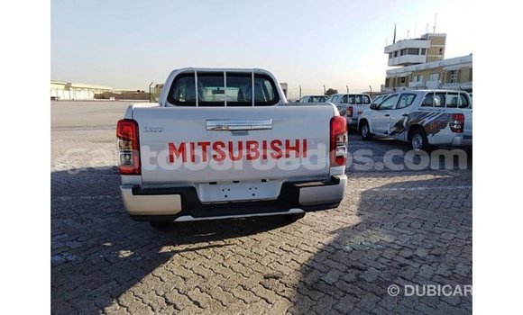 Buy Import Mitsubishi L200 White Car in Import - Dubai in Barbados Buy Import Mitsubishi L200 White Car in Import - Dubai in Barbados