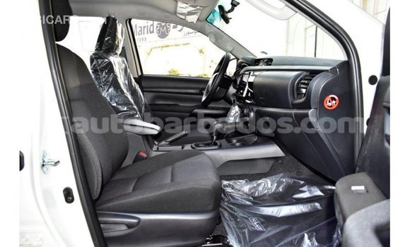 Buy Import Toyota Hilux White Car in Import - Dubai in Barbados Buy Import Toyota Hilux White Car in Import - Dubai in Barbados