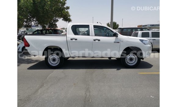 Buy Import Toyota Hilux White Car in Import - Dubai in Barbados Buy Import Toyota Hilux White Car in Import - Dubai in Barbados
