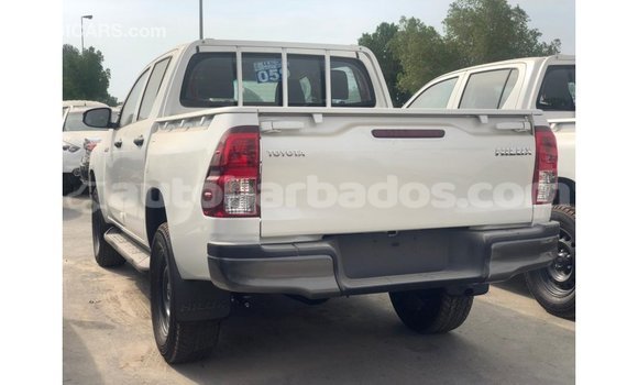 Buy Import Toyota Hilux White Car in Import - Dubai in Barbados Buy Import Toyota Hilux White Car in Import - Dubai in Barbados