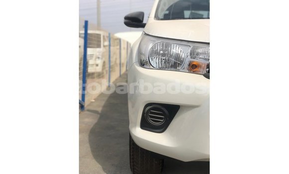 Buy Import Toyota Hilux White Car in Import - Dubai in Barbados Buy Import Toyota Hilux White Car in Import - Dubai in Barbados